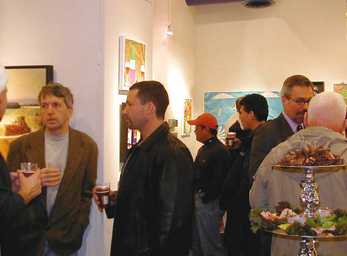 Artist: Gallery Event Photos, Title: Bill Braun enjoys a brief conversation - click for larger image