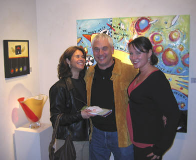 Artist: Gallery Event Photos, Title: Collectors, JoAnne and Doug pose happily with their new painting and Ms. Tomassi - click for larger image