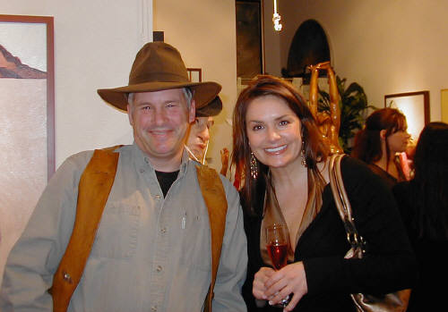 Artist: Gallery Event Photos, Title: Our old cowpoke friend Jamie poses with new patron Lisa - click for larger image